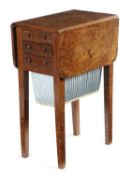 A REGENCY BURR YEW SEWING TABLE C.1815 the drop-leaf top above two drawers and a pull-out bag to one