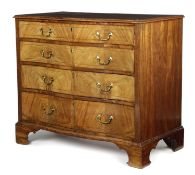 A GEORGE III MAHOGANY SERPENTINE CHEST C.1780 inlaid with stringing, the crossbanded moulded edge
