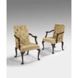 A FINE PAIR OF GEORGE II MAHOGANY ARMCHAIRS C.1755 each with a padded back and seat, later covered