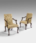 A FINE PAIR OF GEORGE II MAHOGANY ARMCHAIRS C.1755 each with a padded back and seat, later covered