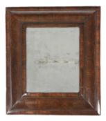A WILLIAM AND MARY OLIVEWOOD OYSTER VENEERED WALL MIRROR C.1690 the apparently period rectangular