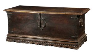 AN ITALIAN WALNUT CHEST 16TH / 17TH CENTURY with an iron escutcheon, key and side carrying handles