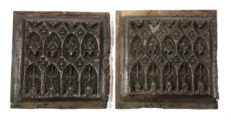 A PAIR OF ENGLISH GOTHIC OAK PANELS ENGLISH C.1450-80 each carved with tracery (2) 22.7 x 22cm