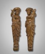 A LARGE PAIR OF WALNUT AND OAK ARCHITECTURAL CARYATID FIGURES POSSIBLY FRENCH OR ITALIAN, 16TH