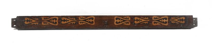 AN OAK, BOG OAK AND HOLLY RAIL C.1600 inlaid with eight scroll decorated lozenges 9.5 x 132.4cm
