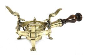 A GEORGE II BRASS CHAFING DISH C.1750 with a cast serpentine shaped ring with three hinged catches