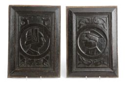 A PAIR OF OAK PORTRAIT PANELS MID-16TH CENTURY each carved with a profile bust, one male, one