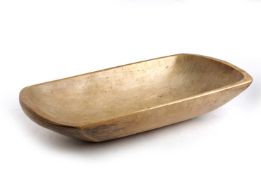 A GEORGE III TREEN SYCAMORE DAIRY BOWL C.1820 of dug-out elongated oval form, each end with an