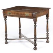 A WILLIAM AND MARY OAK SIDE TABLE LATE 17TH CENTURY the boarded top above a cushion frieze drawer,