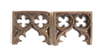 A PAIR OF GOTHIC REVIVAL OAK TRACERY PANELS PROBABLY 19TH CENTURY each decorated with quatrefoils (