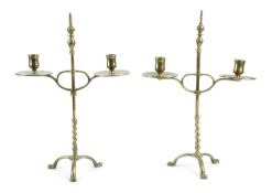 A PAIR OF CAST BRASS TWIN-BRANCH CANDELABRA C.1900 each with an adjustable height tulip-shaped