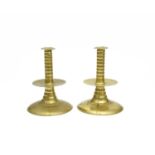 A PAIR OF BRASS TRUMPET BASE CANDLESTICKS IN WILLIAM AND MARY STYLE, LATE 19TH CENTURY each with a