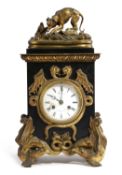 A FRENCH BLACK MARBLE AND GILT BRONZE MOUNTED MANTEL CLOCK C.1870 the brass drum movement with an