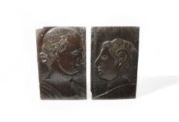 A PAIR OF RELIEF CARVED OAK PORTRAIT PANELS EARLY 17TH CENTURY one depicting a Roman Emperor with