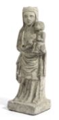 A CARVED STONE FIGURAL GROUP OF THE VIRGIN AND CHILD IN ROMANESQUE STYLE 30cm high