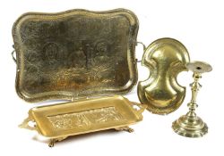 A PERSIAN BRASS SHIELD 18TH / 19TH CENTURY decorated with a crown above a winged lion holding a