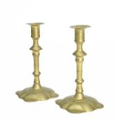 A PAIR OF EARLY GEORGE III BRASS CANDLESTICKS BY EDWARD DURNALL, C.1760 each stamped 'ED DURNALL'