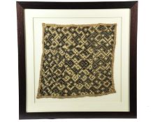 A KUBA CLOTH DEMOCRATIC REPUBLIC OF THE CONGO cut raffia, with geometric designs, framed and