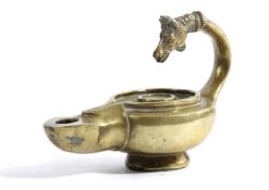 A POLISHED BRONZE GRAND TOUR OIL LAMP IN ROMAN STYLE the handle with a horse's head terminal 18cm