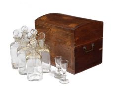 A DUTCH MAHOGANY TANTALUS 19TH CENTURY the case inlaid with paterae and fan spandrels, the fitted