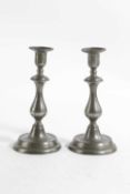 A PAIR OF LATE GEORGE III PEWTER EJECTOR CANDLESTICKS C.1800-20 each having a beading to the