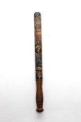 AN EARLY VICTORIAN TRUNCHEON BRIGHTON, SECOND QUARTER 19TH CENTURY the black ground painted with the