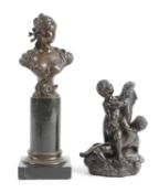 AN ITALIAN BRONZE GROUP OF TWO PUTTI LATE 19TH CENTURY cast wrestling a dolphin, together with a