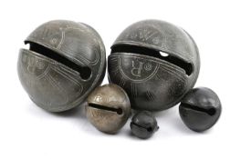 A SMALL COLLECTION OF CROTAL OR RUMBLER BELLS 18TH CENTURY of copper alloy and bronze, three by