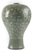 A KOREAN CELADON MEIPING VASE MODERN decorated with cranes and clouds, above a stiff leaf border