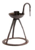 A REGENCY IRON CELLAR LIGHT C.1800-30 having a pronounced hook attached to a deep dished drip-pan,