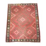 A SARKOY KILIM RUG THRACE, SECOND QUARTER 20TH CENTURY the scarlet field of diamond medallions,