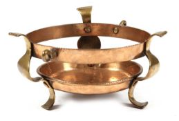 A BRASS AND COPPER CHAFING DISH PROBABLY DUTCH, C.1730-60 with three brass shaped scroll uprights