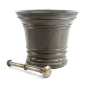 A LARGE DUTCH BRONZE MORTAR C.1700 of flared form with moulded band decoration and with a pestle
