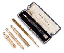 A small collection of gilt metal and base-metal pencils, including: one by Mabie, Todd and Co., No.