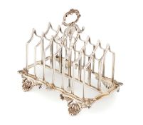 A William IV silver toast rack, by Charles Fox, London 1831, reeded rectangular form with acanthus