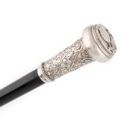 A George IV Royal silver-mounted walking cane, maker's mark of IN, London 1821, the tapering