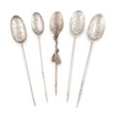 A collection of five 18th century silver mote spoons, comprising: a cast naturalistic one, unmarked,