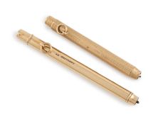 A 9-carat gold drop-action pencil, by S. Mordan and Co., London 1937, seven-sided form, engine-