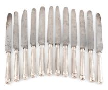 A set of twelve George III silver Shell and Thread pattern table knives, by Paul Storr, London 1813,