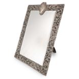 An Edwardian silver-mounted mirror, by The Goldsmiths & Silversmiths Co., London 1902, rectangular