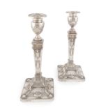 A pair of modern silver candlesticks, By Barker Ellis Silver Co., Birmingham 1976, square tapering