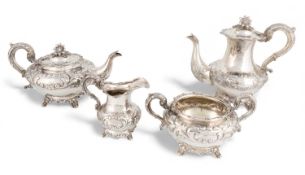 λ A Victorian silver four-piece tea set, by Henry Holland, London 1839, circular bellied form with