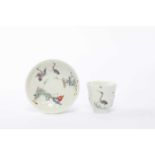 A SAINT CLOUD ARTICHOKE-MOULDED FLARED CUP AND SAUCER C.1730-40 painted in the kakiemon palette with