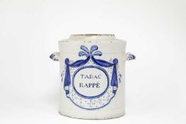 A DELFTWARE TOBACCONIST JAR DUTCH, 18TH CENTURY of cylindrical form, inscribed in blue 'TABAC
