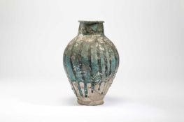 A RAQQA POTTERY VASE SYRIA, PROBABLY 11TH / 12TH CENTURY of shouldered ovoid form, with vertical