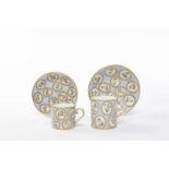 TWO SEVRES CANS AND SAUCERS (GOBELETS LITRON ET SOUCOUPE) C.1765-70 both decorated with tulip sprays