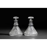 A PAIR OF GLASS SHIP'S DECANTERS AND STOPPERS C.1800 each cut with horizontal bands around an oval