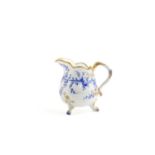 A SMALL SEVRES MILK JUG (POT A LAIT A TROIS PIED) C.1767 painted in blue enamel with a band of