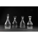 FOUR REGENCY GLASS DECANTERS AND STOPPERS EARLY 19TH CENTURY each of Prussian form cut with