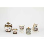 A SEVRES CREAM JUG DATE CODE FOR 1765 painted with exotic birds inside tooled gilt foliage, an ice